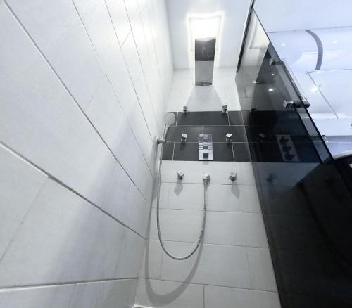 a bathroom with a toilet and a glass wall at Studio Cagnes-Sur-Mer, Bord de mer, Côte d'Azur in Cagnes-sur-Mer