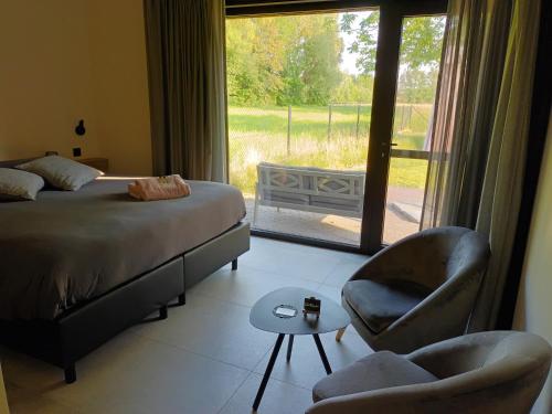 Postel nebo postele na pokoji v ubytování B&B Snelleghem