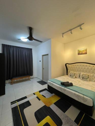 Una cama o camas en una habitación de Idaman Maya