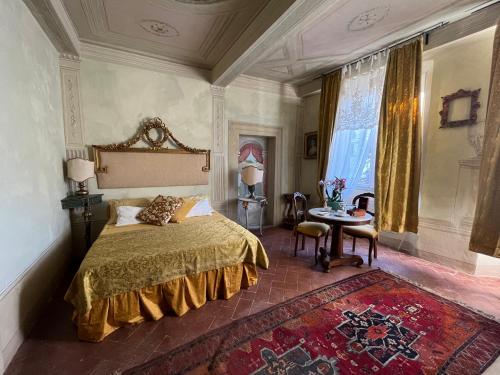 A bed or beds in a room at B&B Alla Corte dei Medici