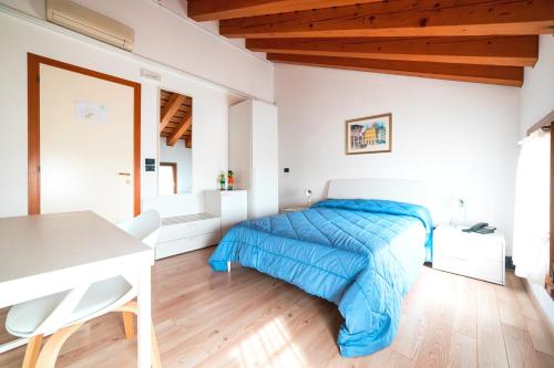 Una cama o camas en una habitación de Col Delle Rane