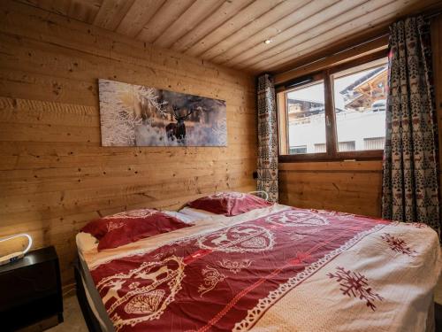 En eller flere senge i et værelse på Grand appartement 4 pièces, 8 pers, animaux admis - FR-1-676-173