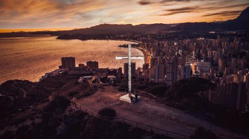 an aerial view of a city and a body of water at Luxury apartment Residencial Sunset Drive - Benidorm, España in Benidorm