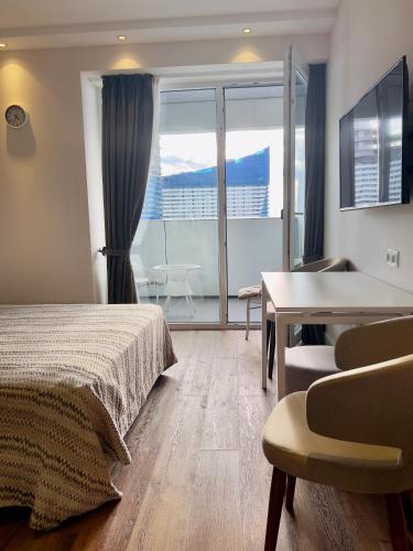 Apartment in Alliance palace on the Justice sideにあるベッド