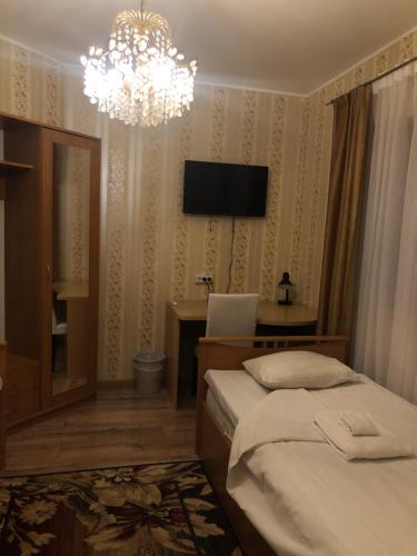 Ένα ή περισσότερα κρεβάτια σε δωμάτιο στο Riia Villa