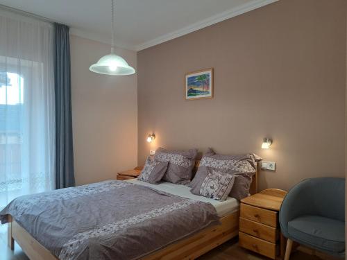 Postel nebo postele na pokoji v ubytování Andrea Villa Hévíz I Balaton