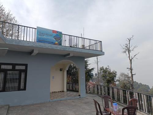 Balkón nebo terasa v ubytování Manaskhand Homestay Naini Majkhali