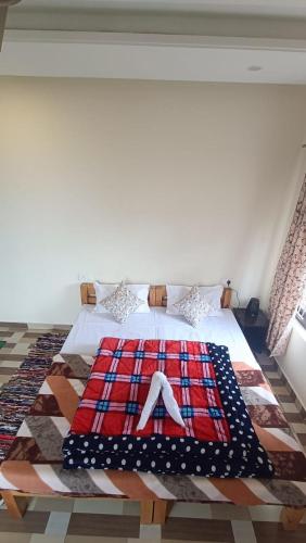 Postel nebo postele na pokoji v ubytování Manaskhand Homestay Naini Majkhali