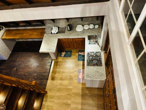 an overhead view of a kitchen in a house at Cabin 7000 feet Nuwaraeliya in Nuwara Eliya