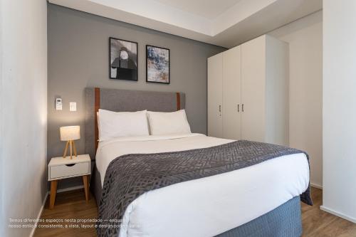 Un ou plusieurs lits dans un hébergement de l'établissement Setin Downtown Genebra by Viva - Apartamentos completos na Bela Vista com piscina