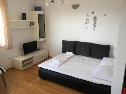 Postel nebo postele na pokoji v ubytování Apartment Tihana