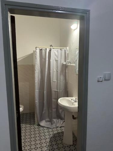 Koupelna v ubytování Pousada de Namacurra
