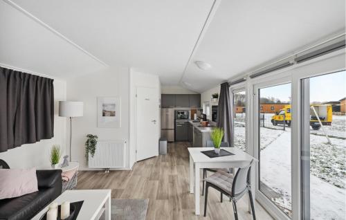 a living room with a couch and a table at Charlet in Süsel