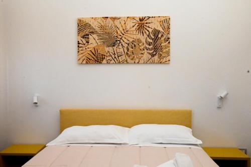 Postel nebo postele na pokoji v ubytování GIKLA MAISON
