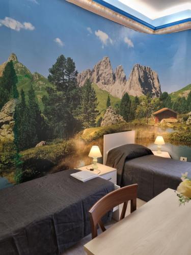 A bed or beds in a room at Palazzo Moraschi Subiaco