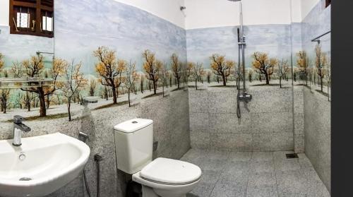 Kúpeľňa v ubytovaní Sandaru Villa