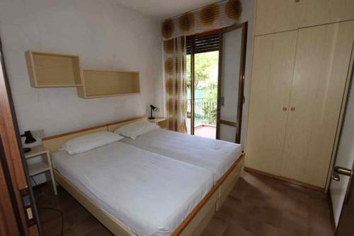 Postel nebo postele na pokoji v ubytování Residences La Rustica & Elite