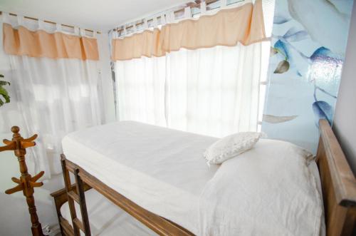 Postel nebo postele na pokoji v ubytování Capital Hostel