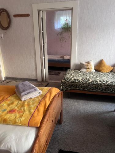 Кровать или кровати в номере Mehrbettzimmer Erdgeschoss