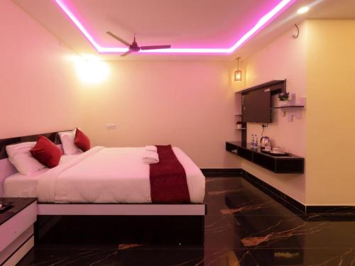 Katil atau katil-katil dalam bilik di beestay Hotels Elite Park Tirupati