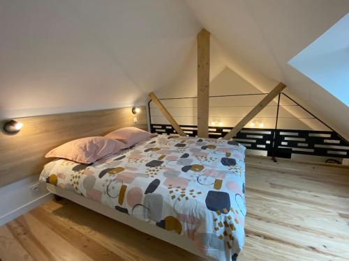 En eller flere senge i et værelse på Les Sept Îles