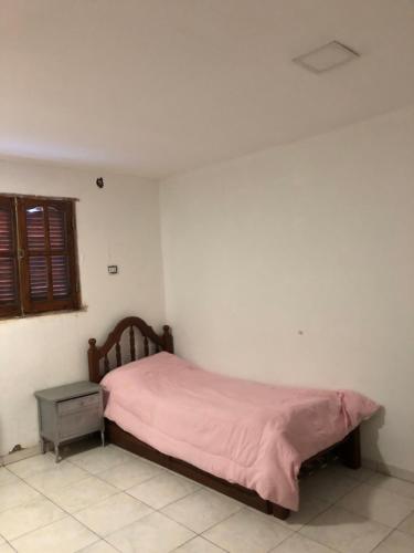 Postel nebo postele na pokoji v ubytování Casa los aromo