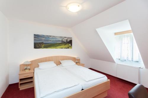 Postel nebo postele na pokoji v ubytování Gästehaus Ferk - Frühstückspension, Bed & Breakfast
