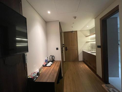 Kuchyň nebo kuchyňský kout v ubytování HAPPY CONDOTEL - Apec Phu Yen -Phòng 42m2