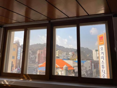a view of a city from a window at Ogeri76 in Mokpo