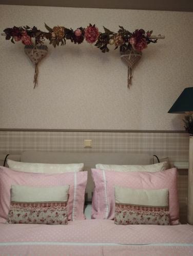 Ένα ή περισσότερα κρεβάτια σε δωμάτιο στο 22 La Maisonette