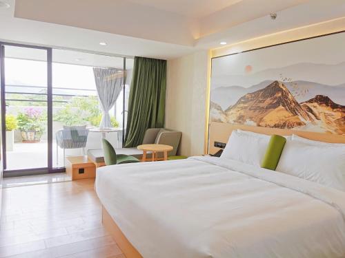 Postel nebo postele na pokoji v ubytování Connar Hotel - Shenzhen Futian