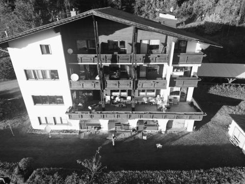 an aerial view of a large house with a yard at Herzogberghof in Kindberg
