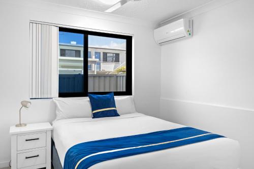 Postel nebo postele na pokoji v ubytování Montego Mermaid Beach Motel