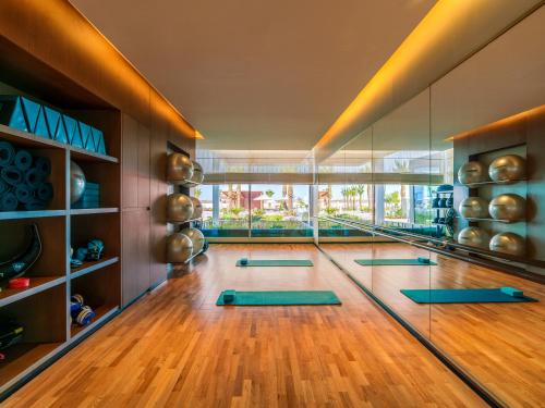 a room with a bowling alley with mats on the floor at Rixos Gulf Hotel Doha in Doha