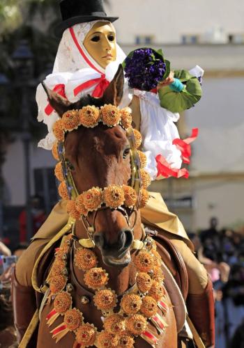 a person in a costume on a horse at Sardinia ovest in Oristano