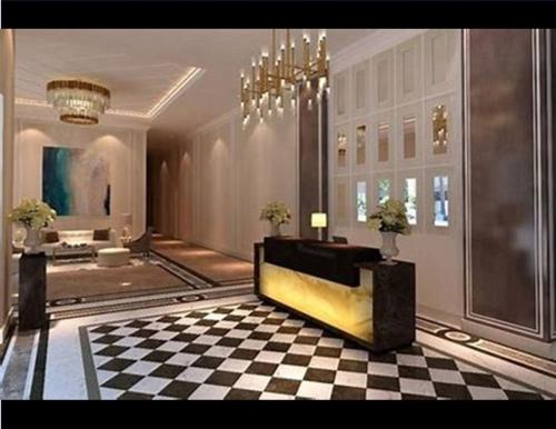 uma sala de estar com piso em xadrez e um lustre em Saint Honore Condominium em Iloilo