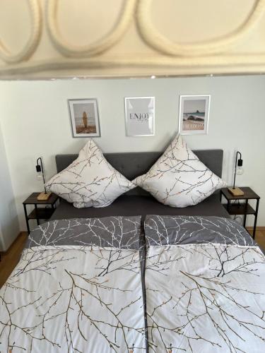 Ένα ή περισσότερα κρεβάτια σε δωμάτιο στο Feel like Home 2