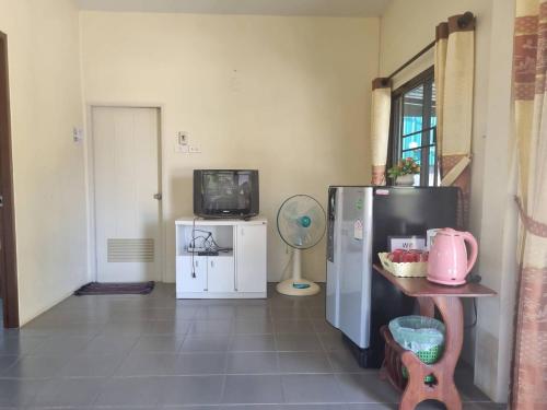 Kuchyň nebo kuchyňský kout v ubytování Phuvieng Resort Chiangsaen