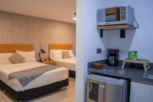 Kuchyň nebo kuchyňský kout v ubytování Hotel Bambu Milla De Oro