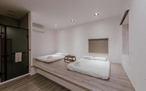Katil atau katil-katil dalam bilik di Chill House
