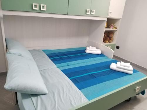 Postel nebo postele na pokoji v ubytování A casa di nonno Pippo
