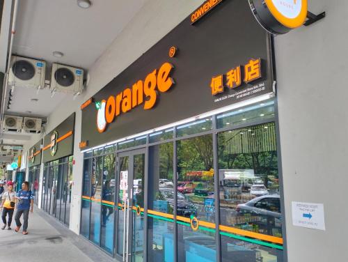 a dunkin donuts store with people walking outside of it at JQ1 SEA & POOL or CITY View WIFI I WASHING MACHINE for Some Units I CUCKOO WATER Jesselton Quay by R2 in Kota Kinabalu