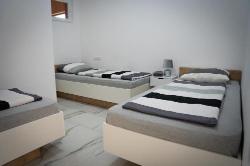 Кровать или кровати в номере Apartment Una Laguna