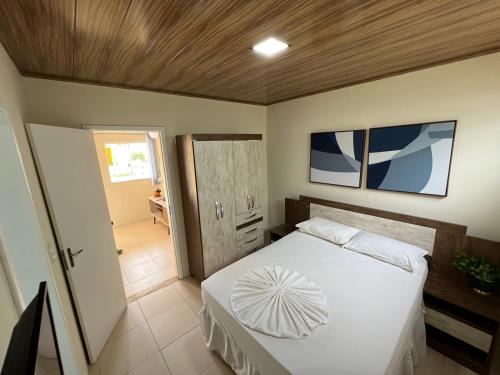 Posteľ alebo postele v izbe v ubytovaní Apartamento em Itaparica