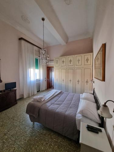 Ένα ή περισσότερα κρεβάτια σε δωμάτιο στο ViaEmilia