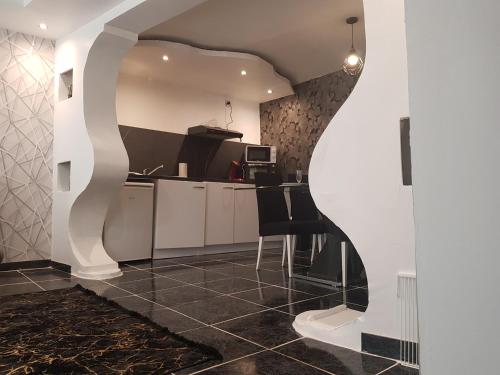 Η κουζίνα ή μικρή κουζίνα στο Appartement diamant