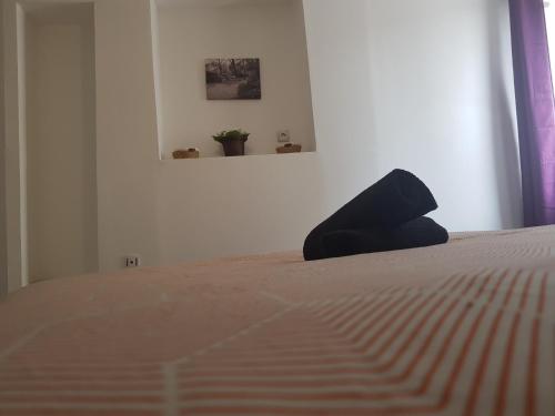 Ένα ή περισσότερα κρεβάτια σε δωμάτιο στο Appartement diamant