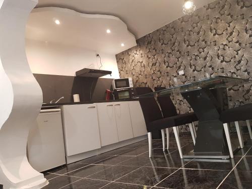 Η κουζίνα ή μικρή κουζίνα στο Appartement diamant