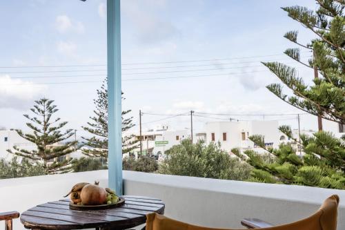a turkey on a plate on a table in front of a window at Aggeliki's Diamond in Agia Anna Naxos