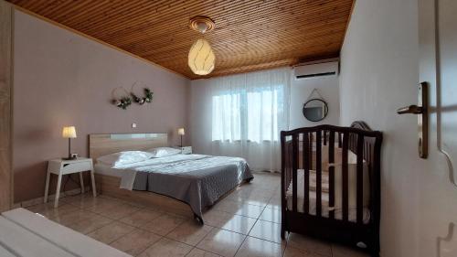Ένα ή περισσότερα κρεβάτια σε δωμάτιο στο Olea Holiday Estate